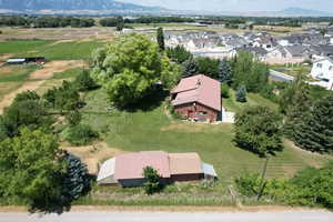Aerial of shop, storage shed, and green house