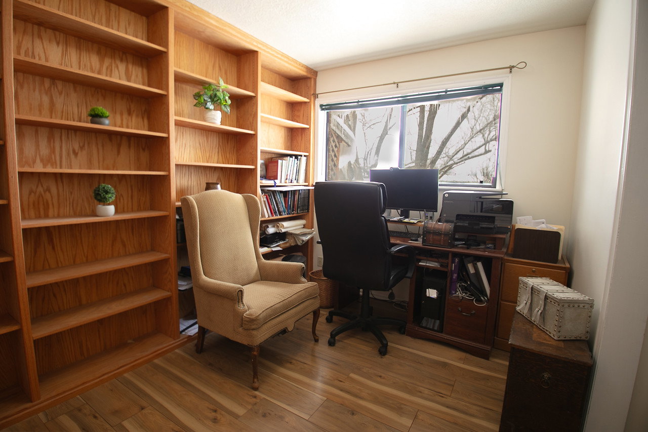 Bedroom/Office 3 on main level featuring light wood finished floors