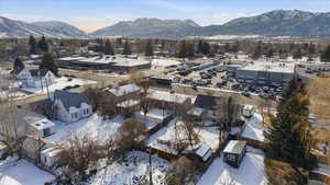 Snowy aerial view with a mountain view