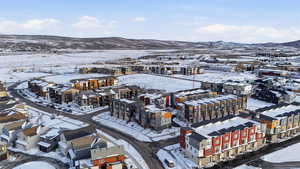 Snowy aerial view with a mountain view