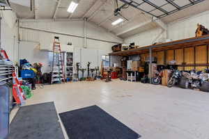 Garage featuring a garage door opener