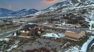 Snowy aerial view with a mountain view