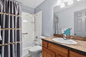 Full bathroom featuring vanity and shower / tub combo