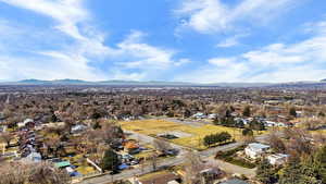 Aerial view of residential area with a mountain backdrop