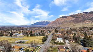 View of mountain background featuring nearby suburban area