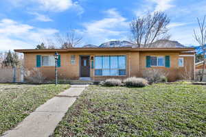 View of front of home with brick siding