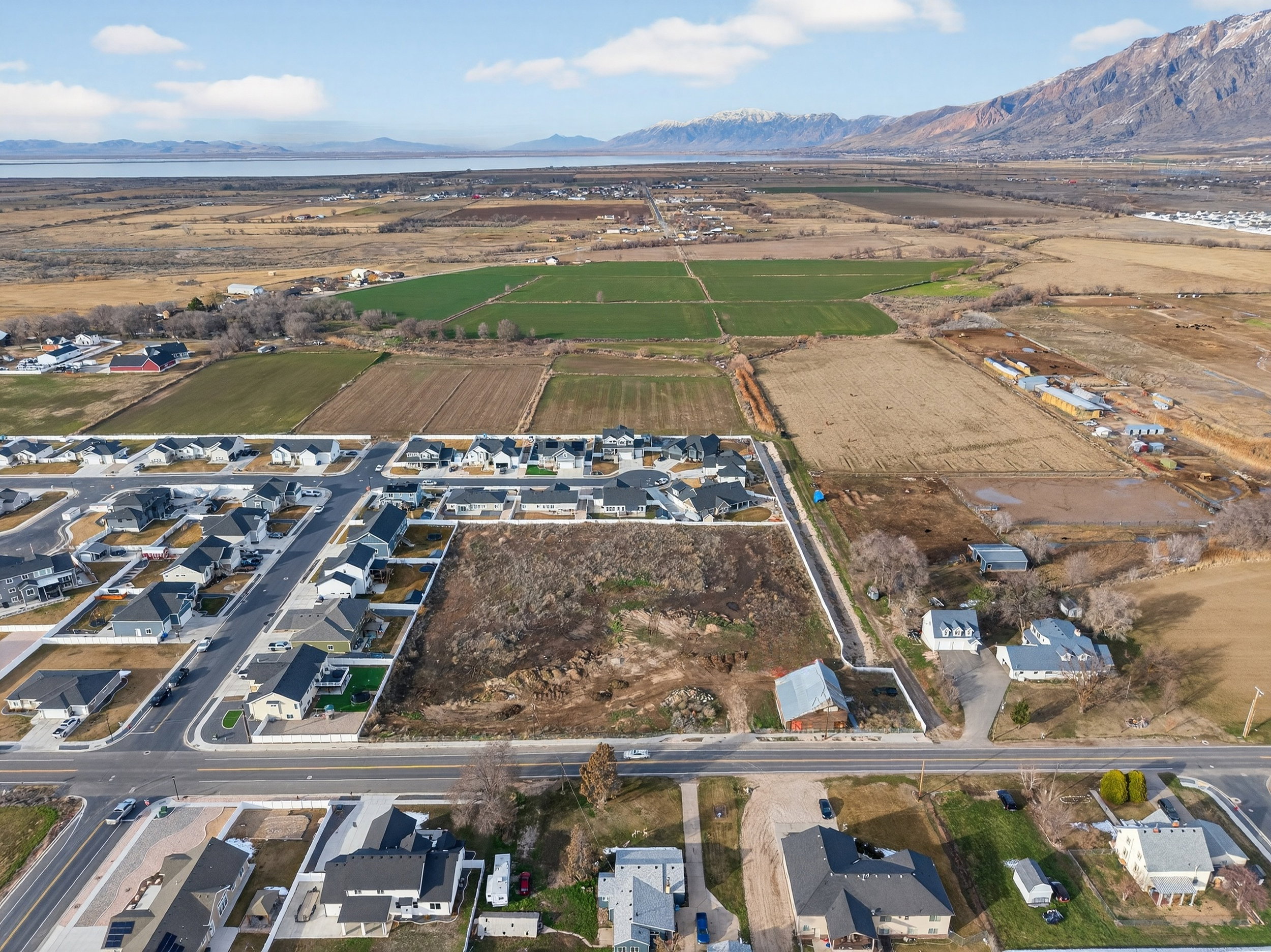 View of property location with rural landscape and nearby suburban area
