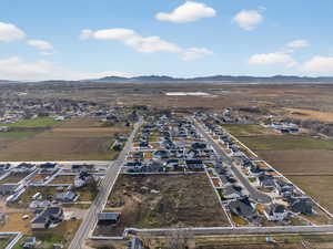 Aerial view of residential area featuring mountains