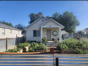 Bungalow with a garden and a porch