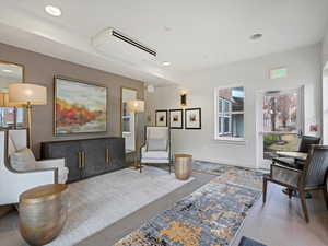 Beautiful main lobby entrance with comfortable seating and vibrant art.