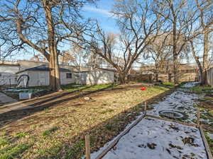 View of fenced backyard