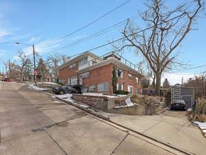 View of home's exterior featuring brick siding