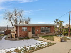 View of front of home with brick siding