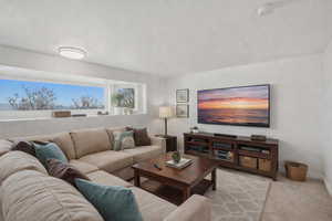 Virtually staged. This room can be used as a bedroom or den/media room.