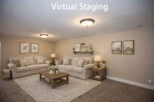 Virtually Staged family room featuring carpet and a textured ceiling