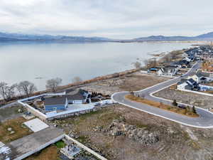 Aerial perspective of suburban area featuring a water and mountain view