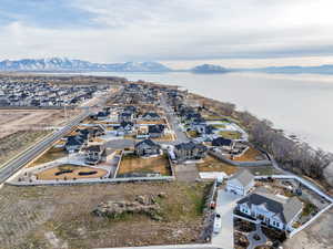 Aerial view of residential area featuring a mountain backdrop