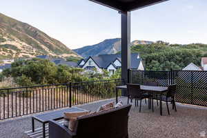 View of patio / terrace with a mountain view and outdoor lounge area