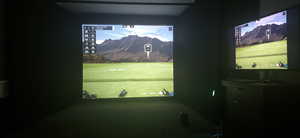 Recreation room featuring golf simulator