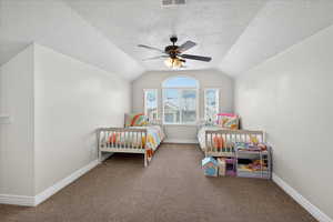 Carpeted bedroom with baseboards and a ceiling fan