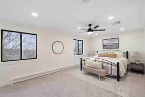 Bedroom with carpet, ceiling fan, ornamental molding, and recessed lighting