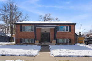 View of front of home with brick siding