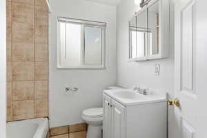 Bathroom with vanity and tile patterned flooring