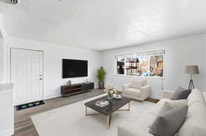 Living room with wood finished floors