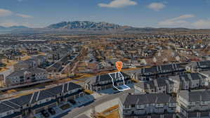 Aerial view of residential area with mountains