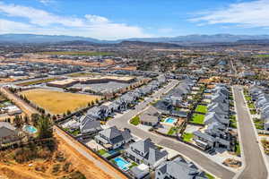 Aerial perspective of suburban area with a mountain backdrop