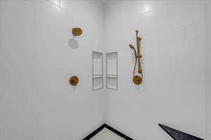 Bathroom view of tiled shower