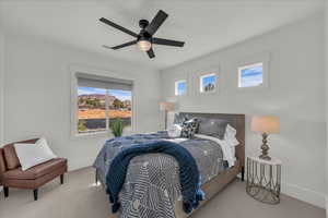 Bedroom with carpet and ceiling fan