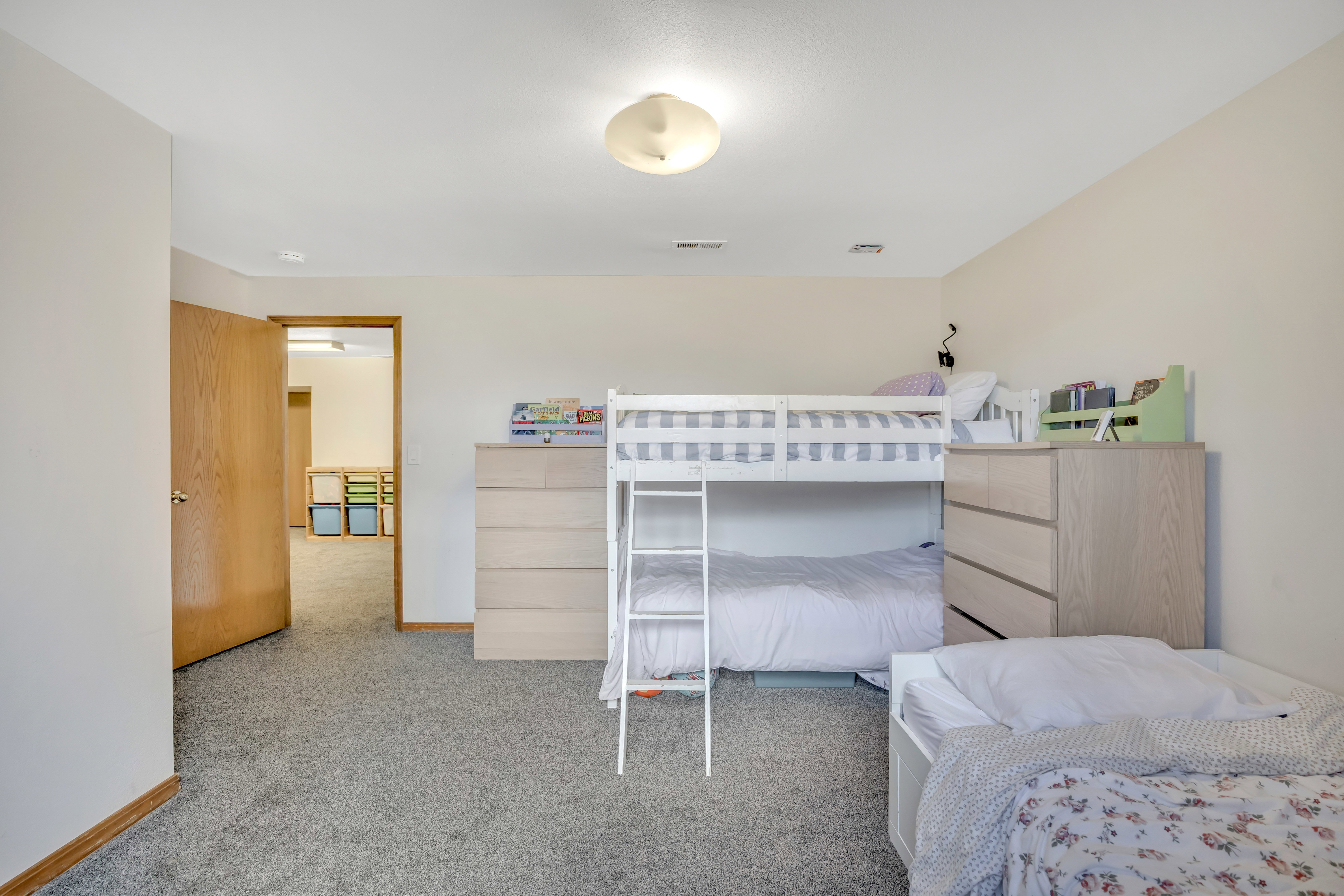 Carpeted bedroom with baseboards