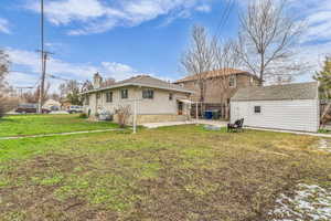 Back yard, NOTE** There is a large garden behind this as well.