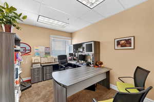 Home office with a paneled ceiling