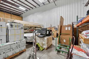 Garage featuring metal wall