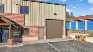 View of property with a garage