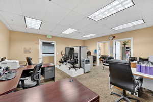 Office featuring a paneled ceiling