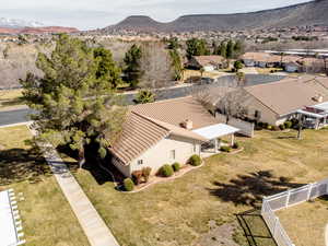Aerial view of residential area featuring mountains