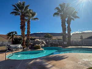 Community pool with a patio area