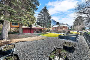 View of green lawn with a mountain view