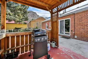 View of patio / terrace featuring area for grilling and a mountain view