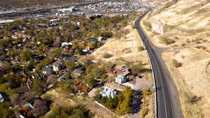 Aerial overview of property's location with nearby suburban area