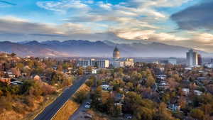View of mountain background featuring nearby urban area