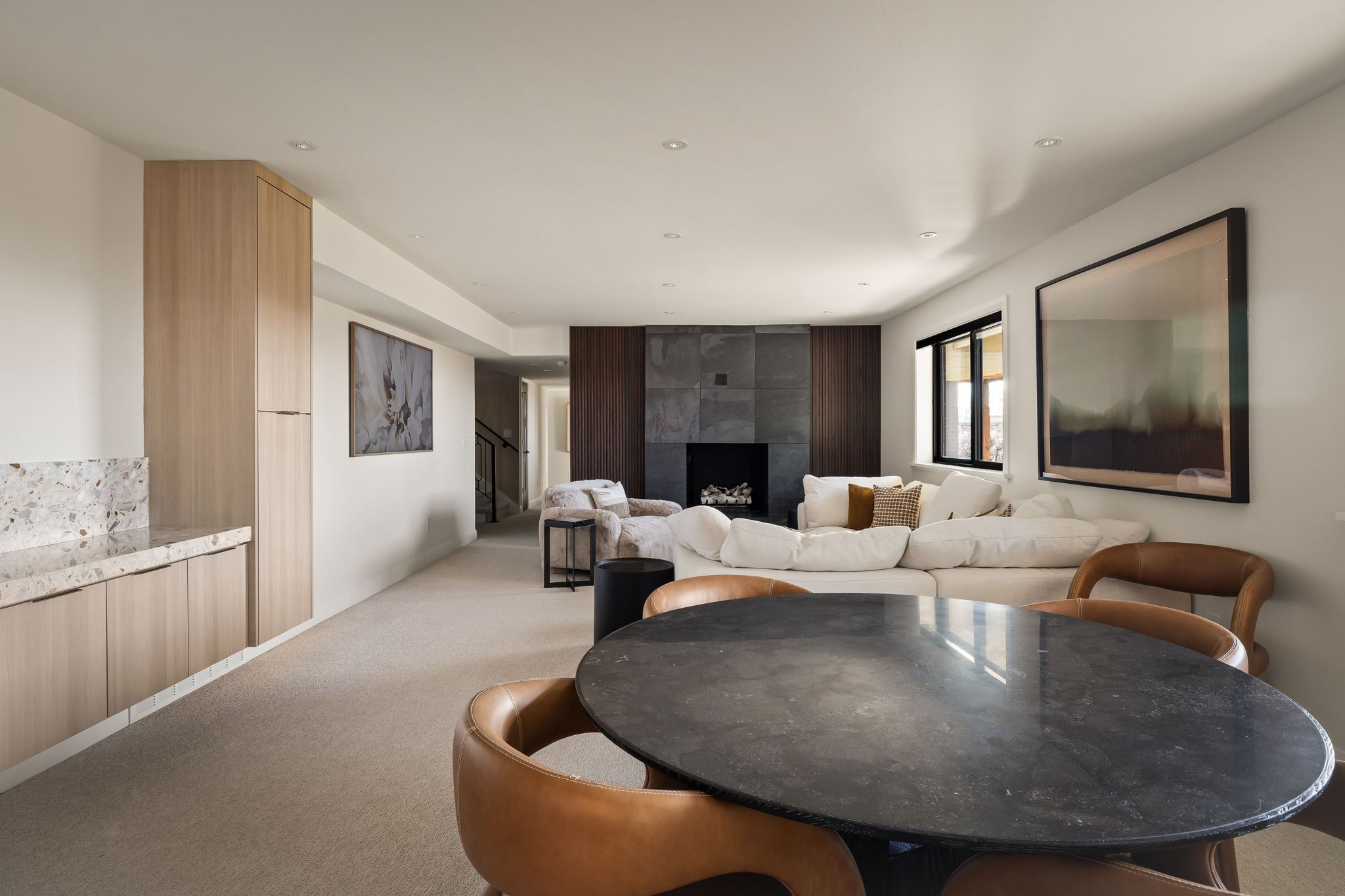 Dining area featuring carpet floors, a fireplace, and recessed lighting