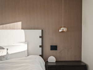 Bedroom with wood finished floors