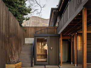 View of exterior entry featuring a patio area