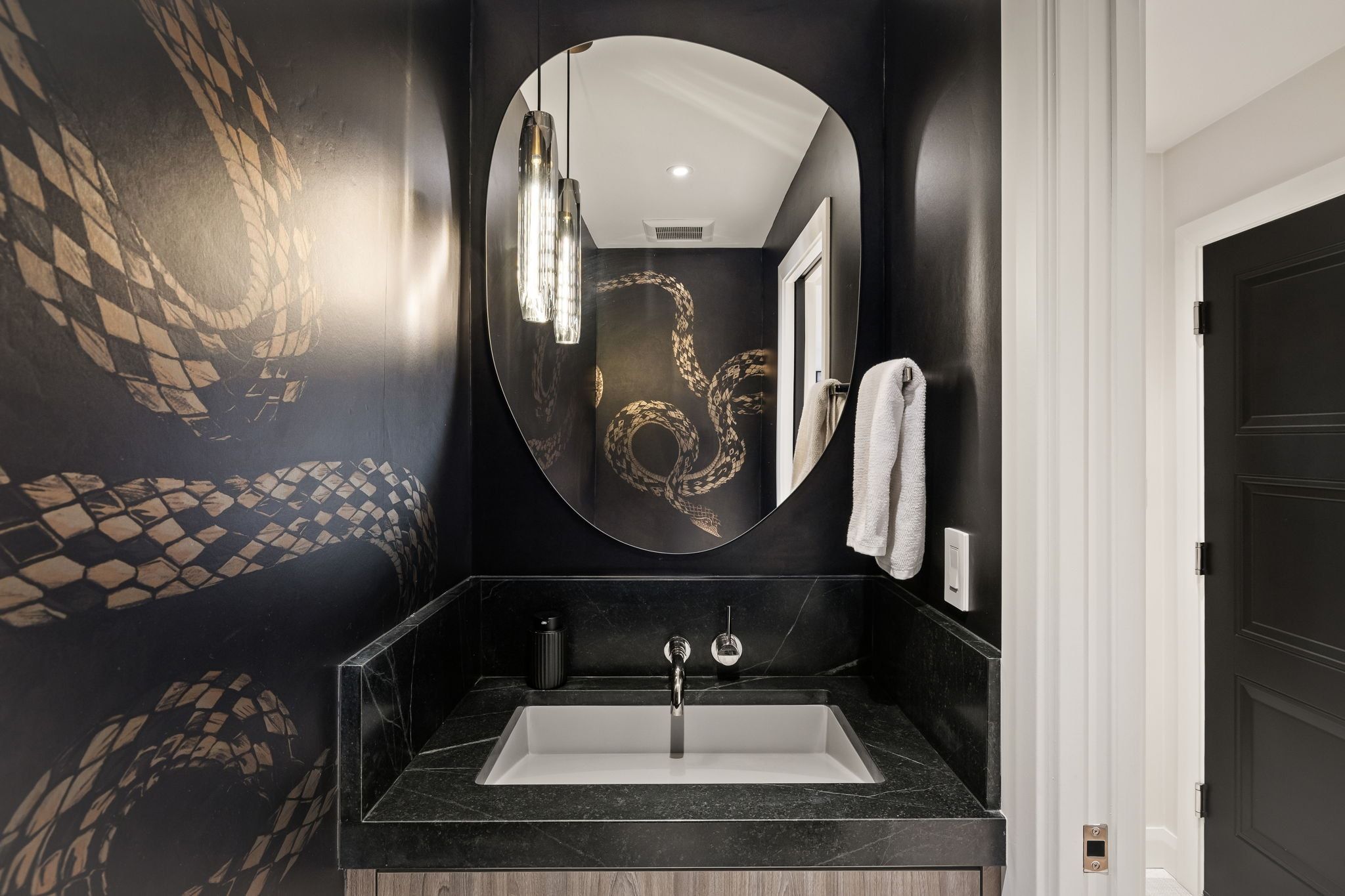Bathroom featuring vanity and recessed lighting