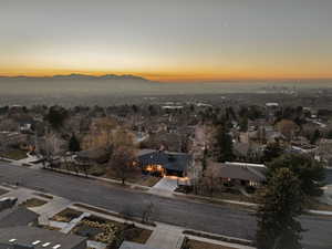 Aerial view at dusk of a residential view and a mountain view