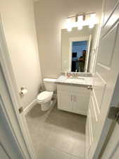 Half bathroom with seller being all proud of his works